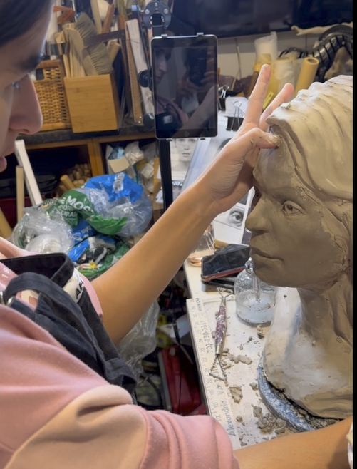 Lara Working on Portrait Sculpture